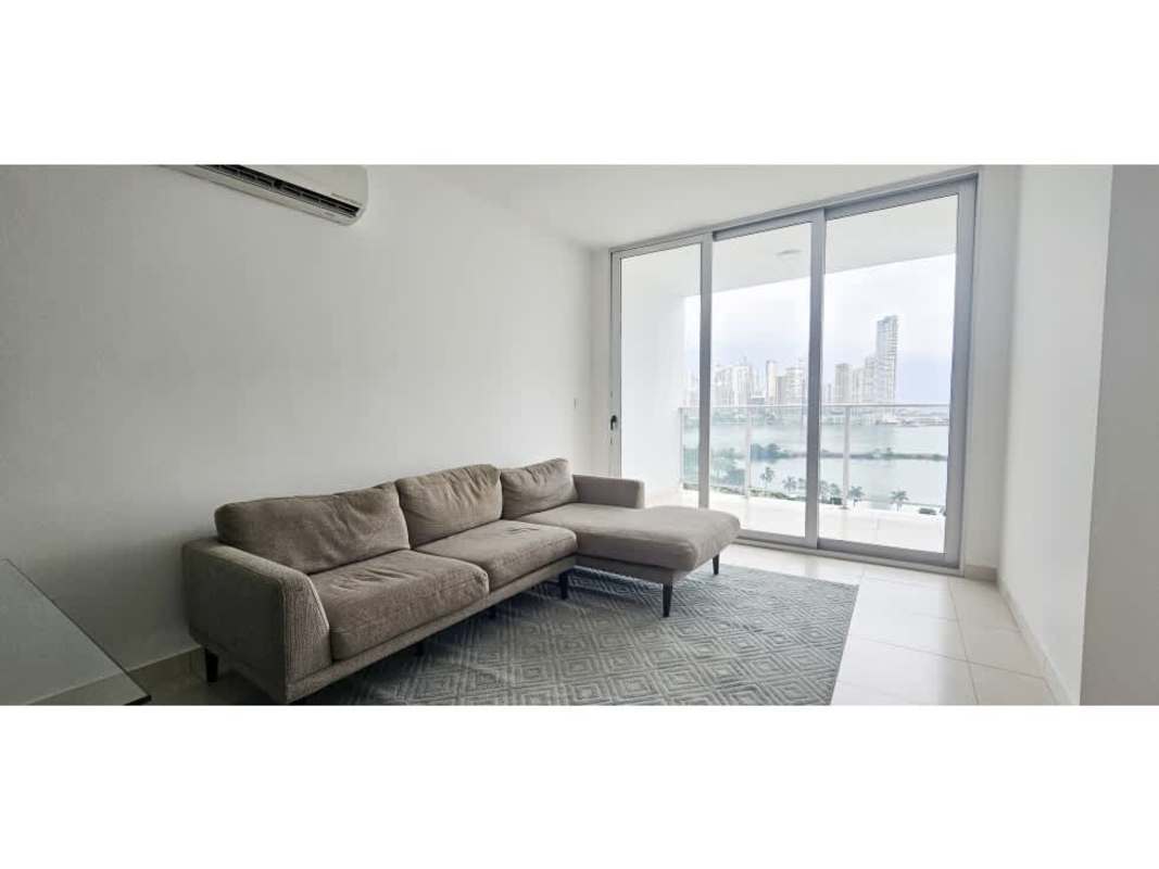 Spacious living room with floor-to-ceiling windows and ocean views in PH White Tower