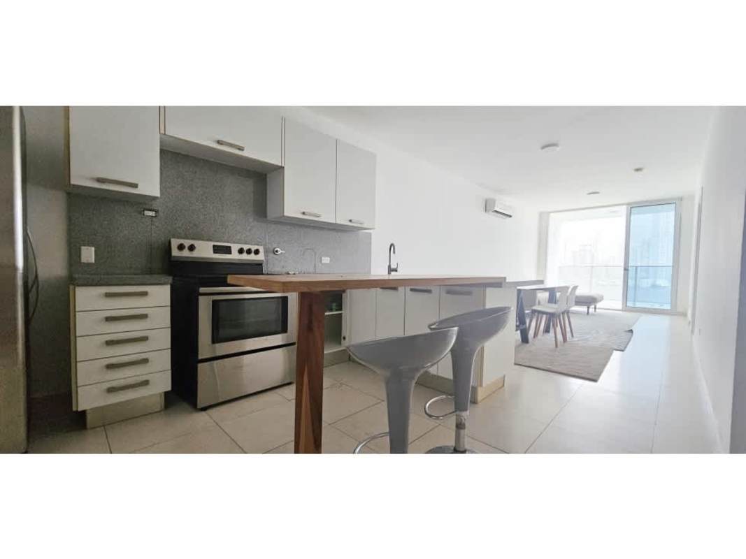 Elegant bathroom with floating vanity, mirror and glass shower in PH White Tower Panama City