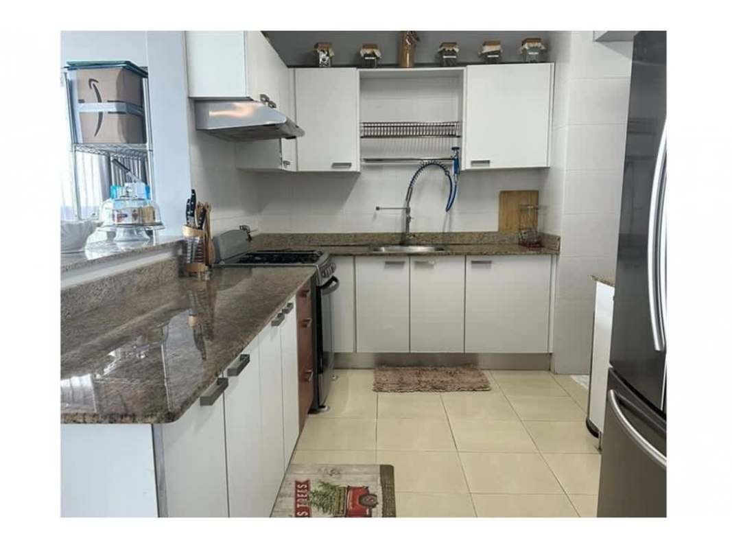 Modern luxury bathroom with glass shower enclosure and granite vanity Grand Bay Tower Panama City