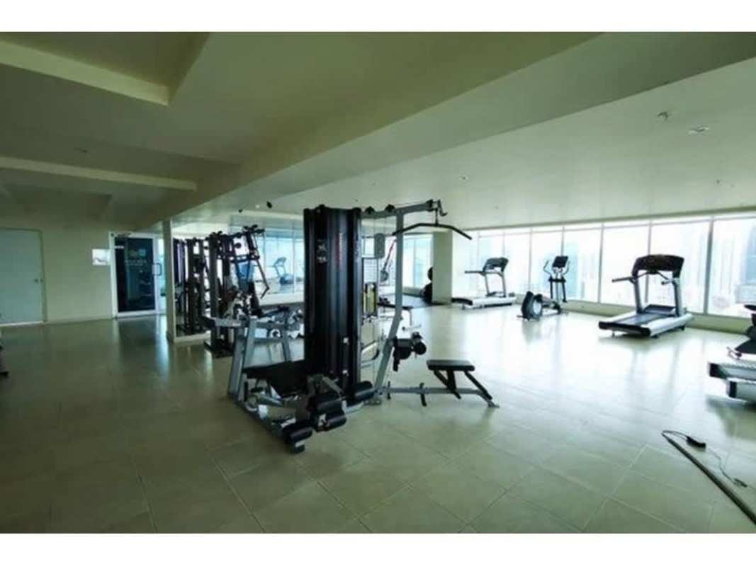 Modern kitchen with granite countertops and stainless steel appliances at PH Grand Bay Tower Avenida Balboa