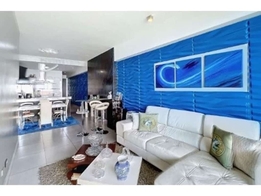 Bright living-dining area in PH Element with panoramic ocean views through floor-to-ceiling glass on Avenida Balboa Panama