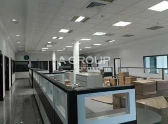Lobby featuring escalators and modern interior in commercial building Colón Free Zone