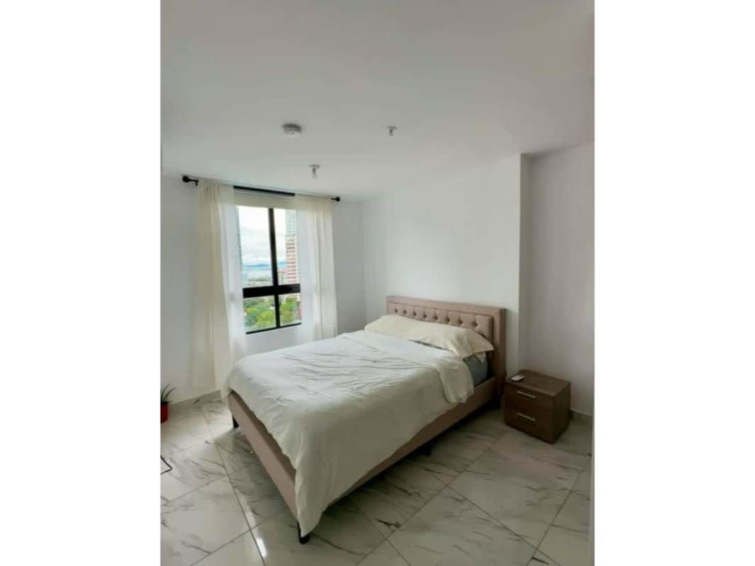 Covered infinity swimming pool atop PH The Gray high-rise with skyline views