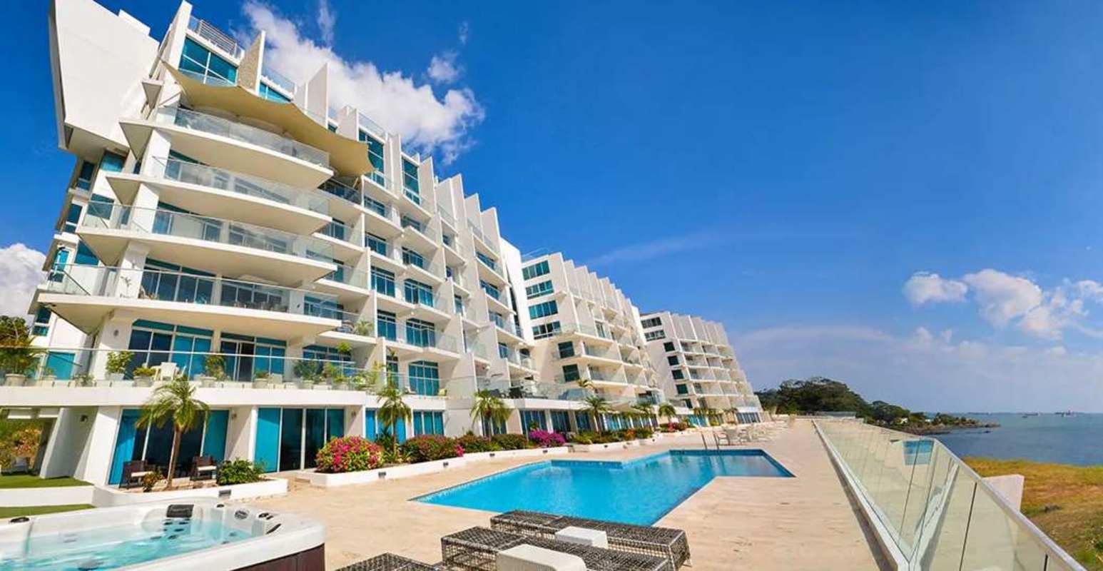 Condominium building balconies pool jacuzzi oceanfront PH Amador Marina Residences Panama