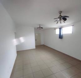 Open plan living room with tiled floors and ceiling fans in Brisas de Arraiján Panama