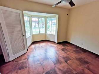 Bright bedroom with bay window and built-in closet Villas de Howard Panama Pacifico