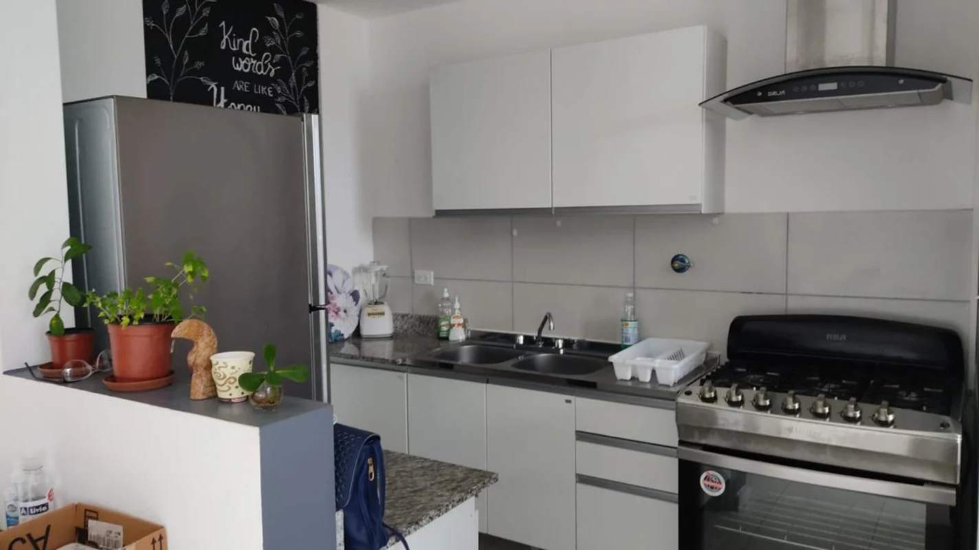 Kitchen with stainless refrigerator granite countertop gas stove PH El Crisol Panama