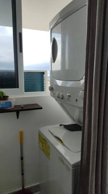 Washer dryer space with ventilation and storage PH El Crisol Apartment Panama City