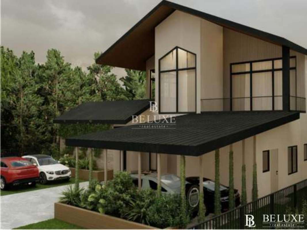 Spacious open living and dining room with double height ceiling luxury custom house Peninsula Estates Santa María