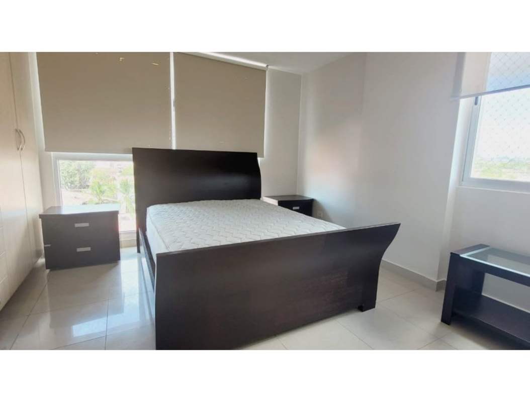 Outdoor swimming pool with tropical landscaping at PH Chanis Residence Panama City