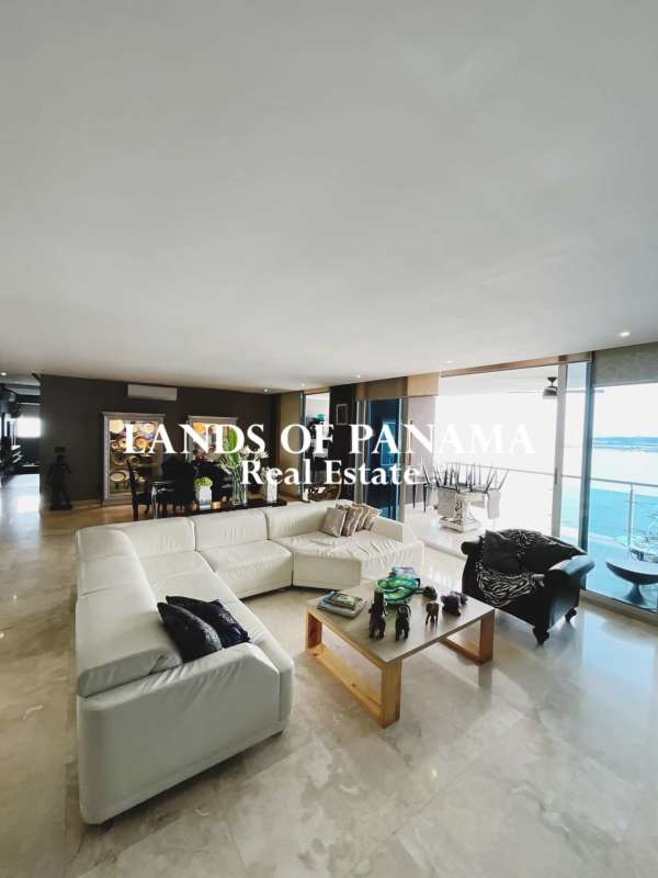 Italian-designed kitchen with appliances, island breakfast bar, marble countertop at PH Aqualina Punta Pacifica Panama