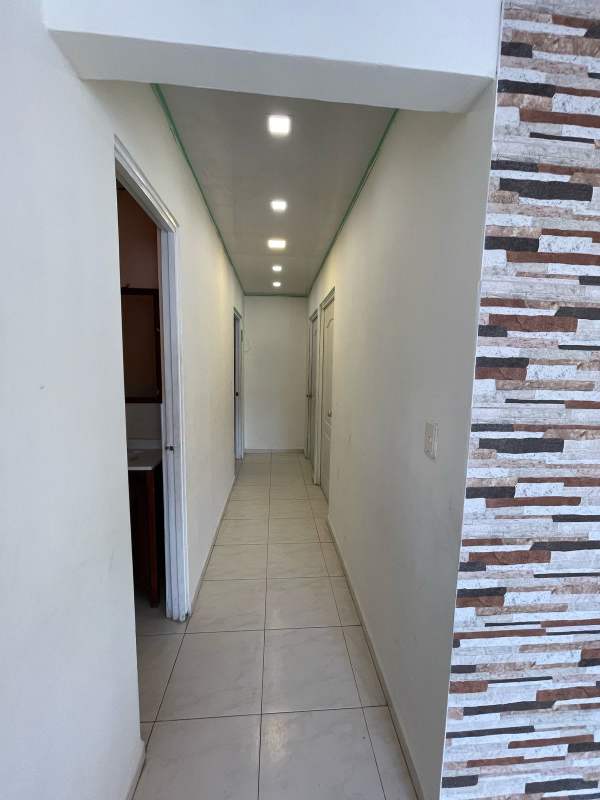 Simple bathroom with pedestal sink, toilet, walk-in shower house for rent Dorasol Panama