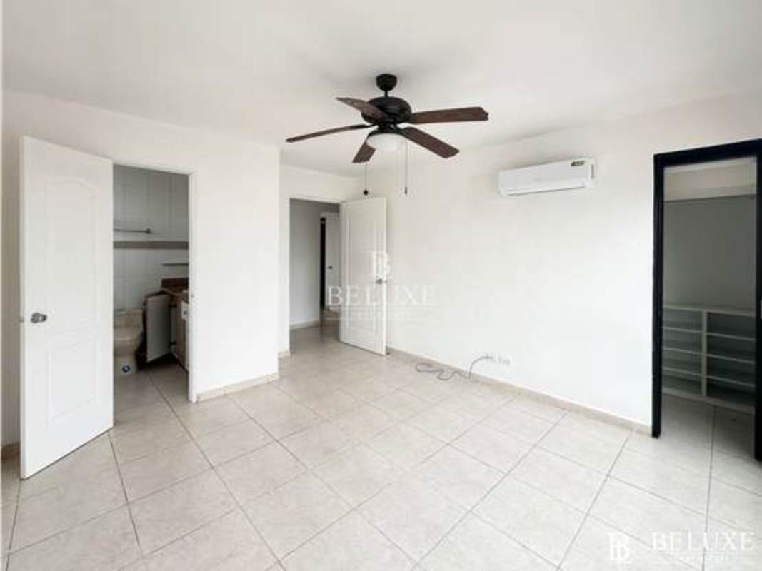Bathroom with glass shower, granite counters at PH Emporium Tower San Francisco Panama
