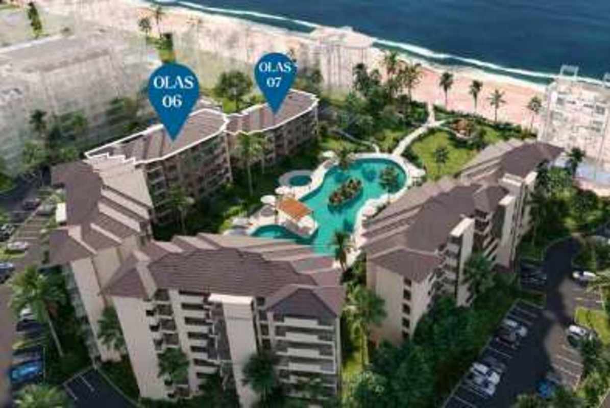 Aerial photo of Olas del Mar condominium complex with pool, gardens, and beach at Punta Chame