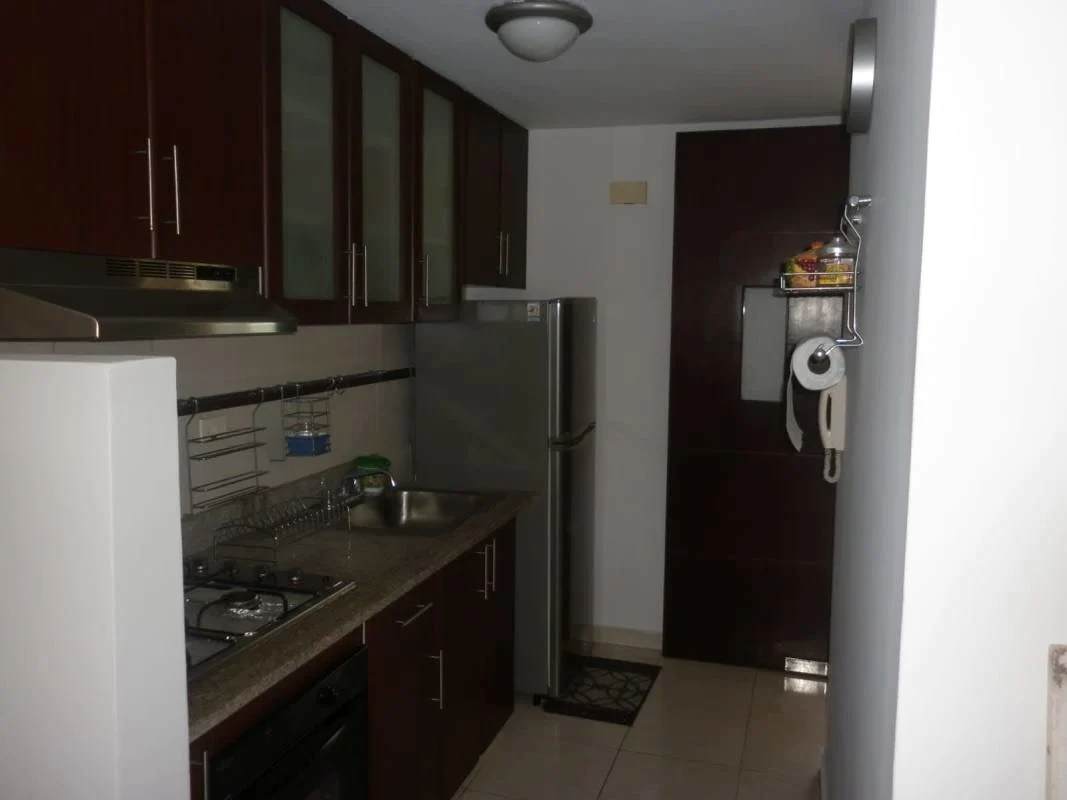 Cozy bedroom with ceiling fan and natural light Condado del Rey Altavista Garden Panama