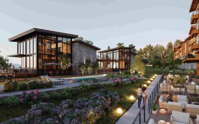 Modern lounge bar with vaulted ceiling, greenery, and wood accents in Boquete luxury clubhouse