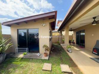 Spacious backyard with covered terrace and garden area in duplex for sale Panama Pacifico