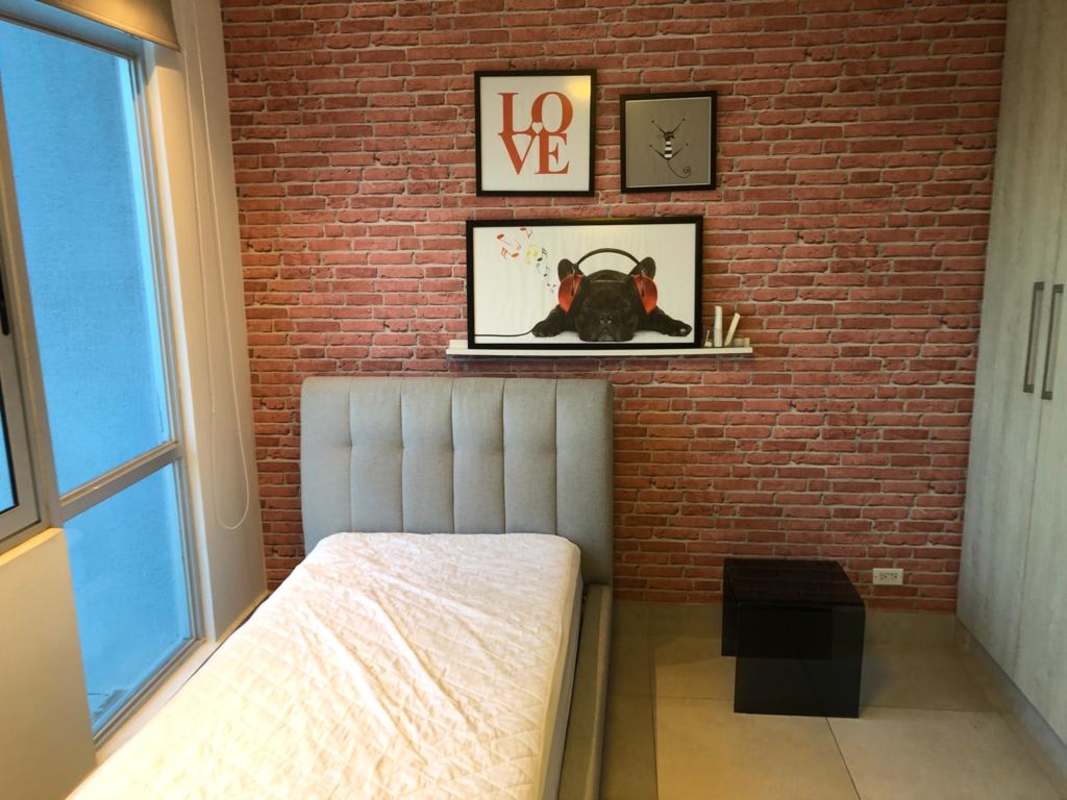 Balcony with panoramic city and mountain views in Dos Mares Betania apartment Panama