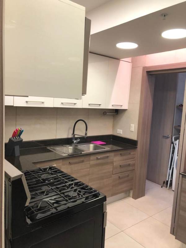 Modern bedroom with panoramic windows city view Dos Mares Betania Panama