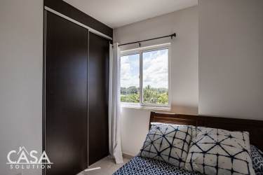 Modern minimalist bathroom with walk-in shower white walls vanity Las Olas Playa Barqueta Panama