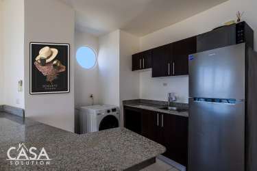 Cozy kitchen with granite countertops wood cabinets appliances ocean view Las Olas Playa La Barqueta Panama