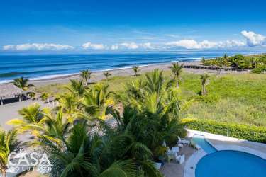 Modern bedroom with dark wood closet, window natural light Playa La Barqueta Las Olas Panama