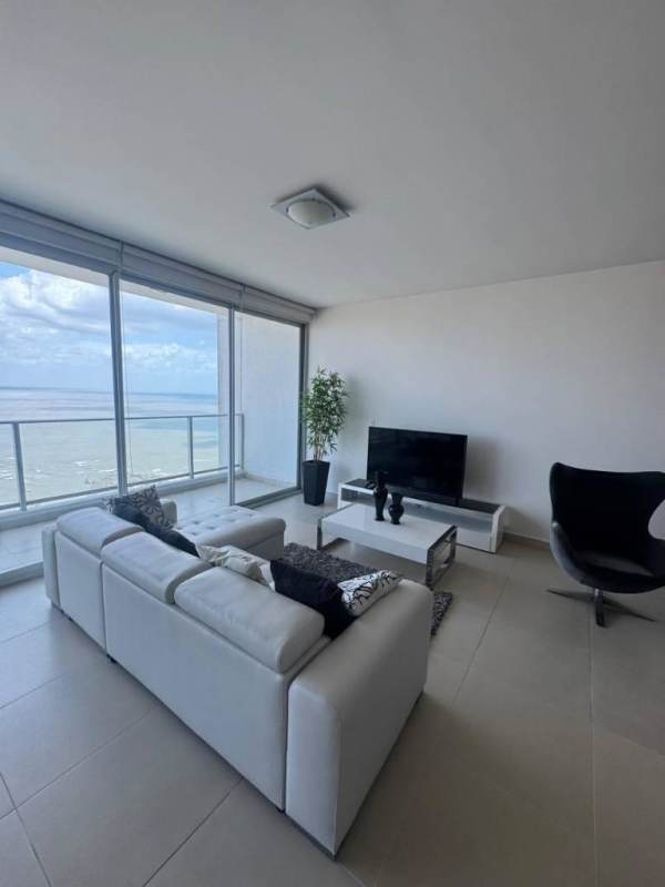 Building lobby with marble floor, chandelier, and wood-panel design in PH Oceanaire Panama