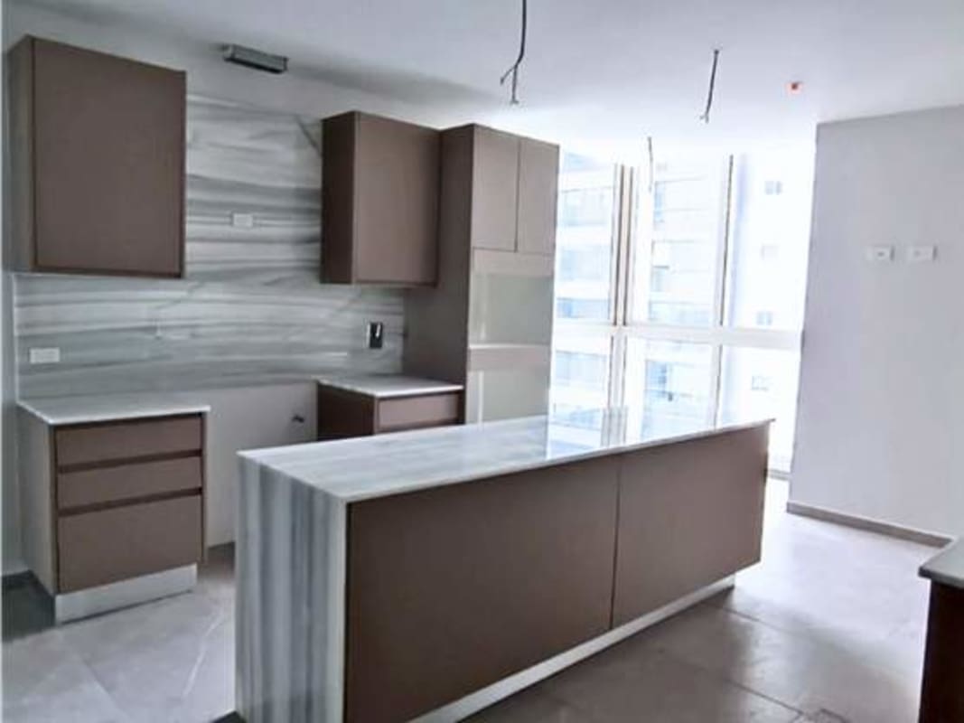 Spacious modern living room with marble floor ocean and skyline views PH The Towers Panama