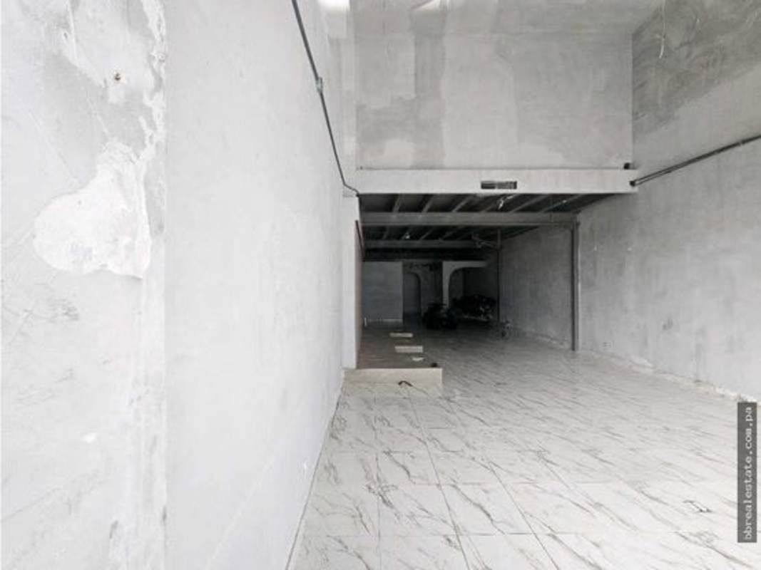 Industrial style commercial space unfinished with marble tiles and loft platform in Obarrio business district