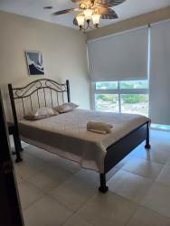 Modern bedroom with built-in closet and AC PH Founders Playa Blanca Panama