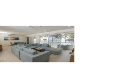 Oceanfront patio terrace with lounge chair beachfront view Playa Caracol Panama