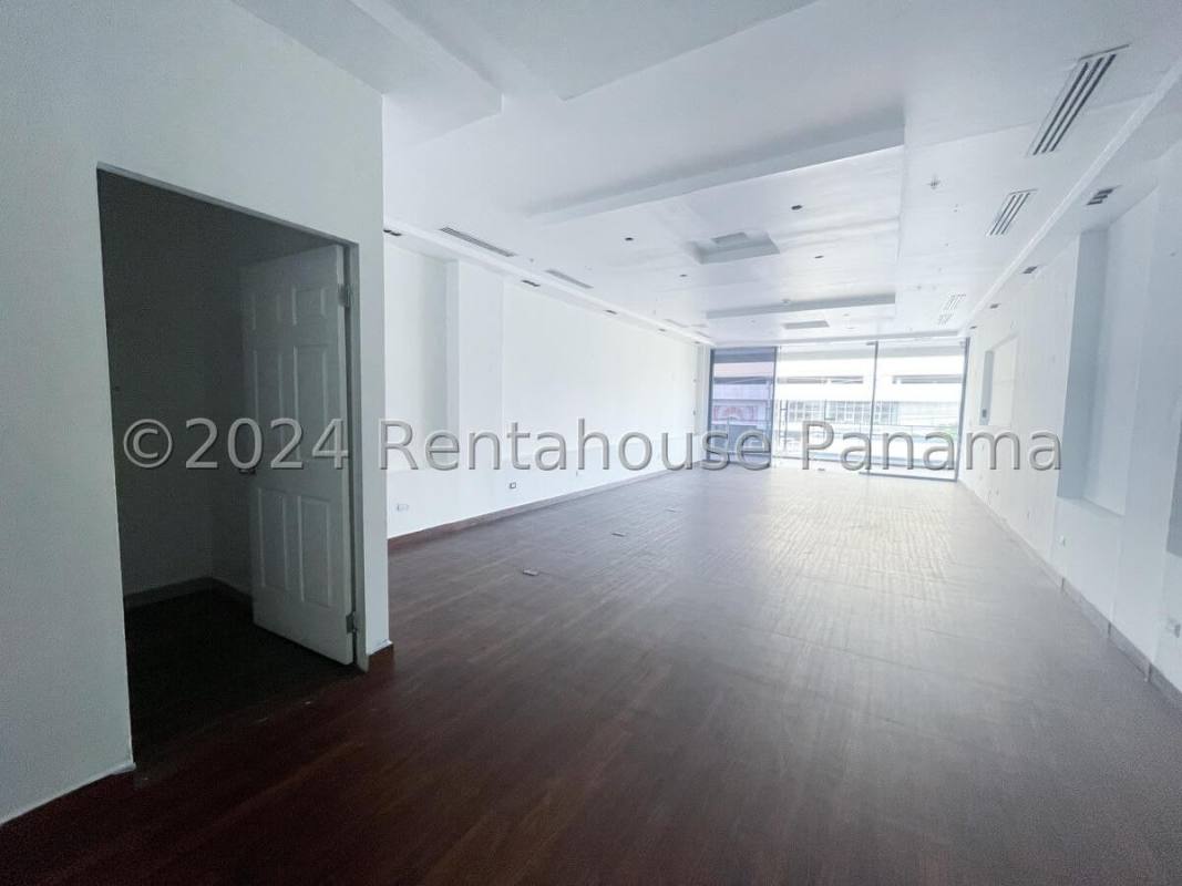 Modern commercial plaza exterior facade and parking lot in 12 de Octubre Panama