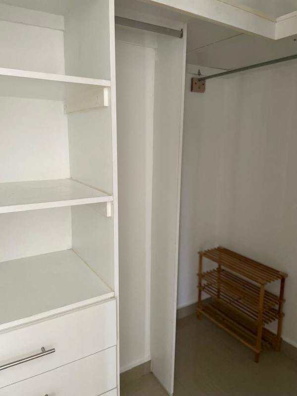Kitchen with granite counters and wood cabinetry at PH San Francisco Bay Panama