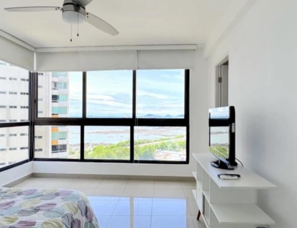 Spacious master bedroom with ocean view balcony at PH San Francisco Bay Panama