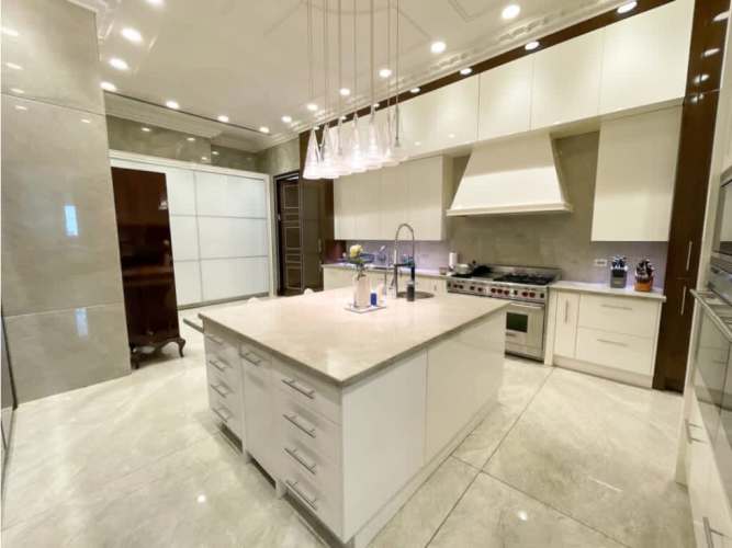 Luxury bathroom with double stone sinks, soaking tub, rainfall shower PH The Residences Panama City