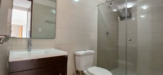 Second bedroom tile floors built-in closet PH Midrise Panama Pacifico