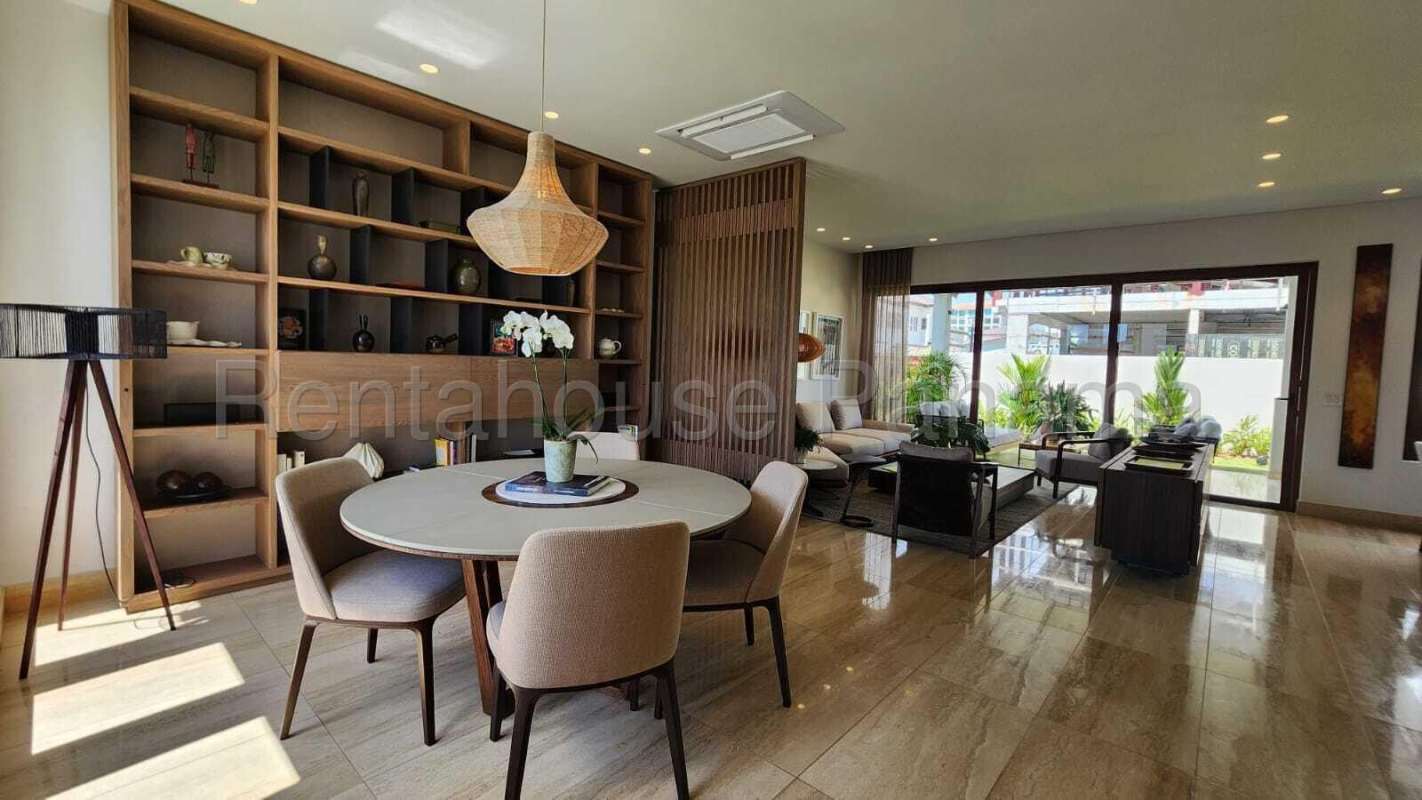 Spacious living dining area marble floor large windows Santa María golf residence Panama