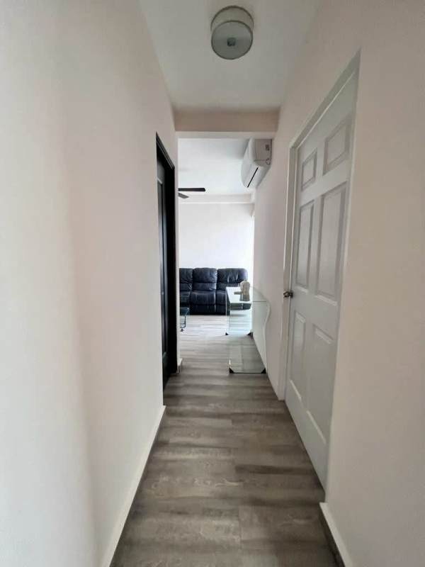 Modern kitchen with granite countertops, dining table, appliances included in PH El Doral Panama City