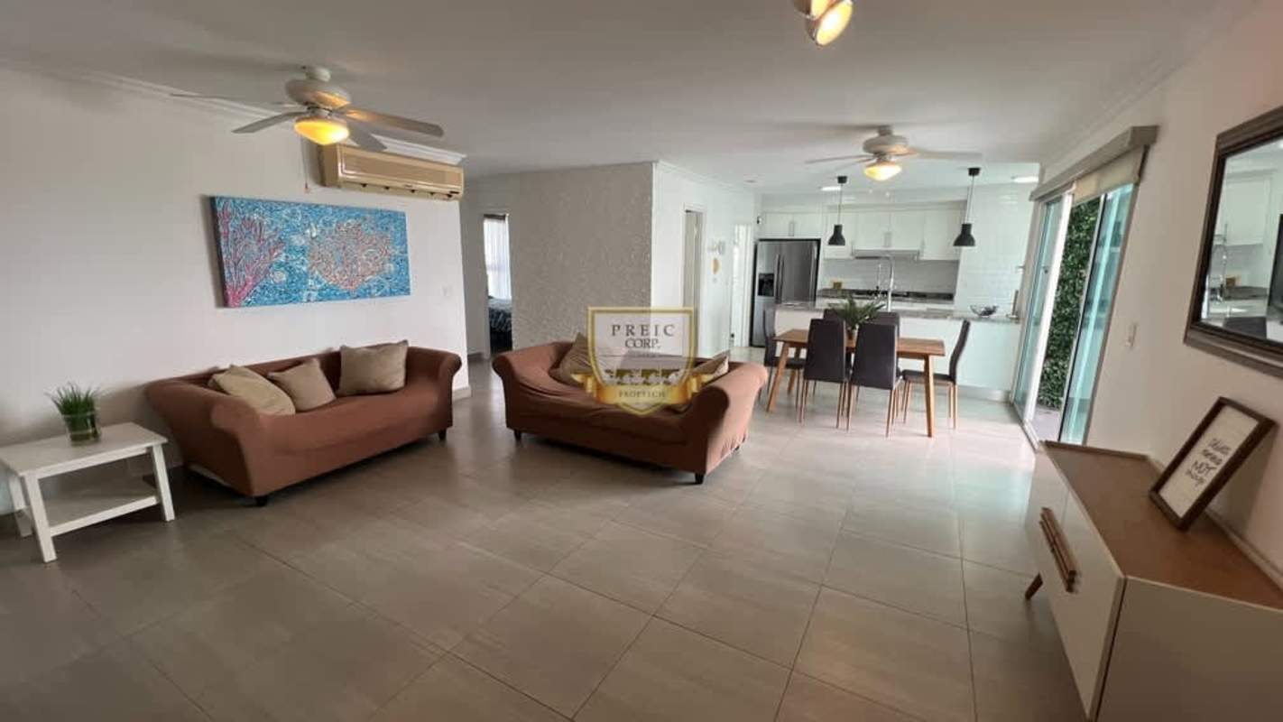 Kitchen with granite countertops, appliances, and ocean view window at PH Moon Tower Panama