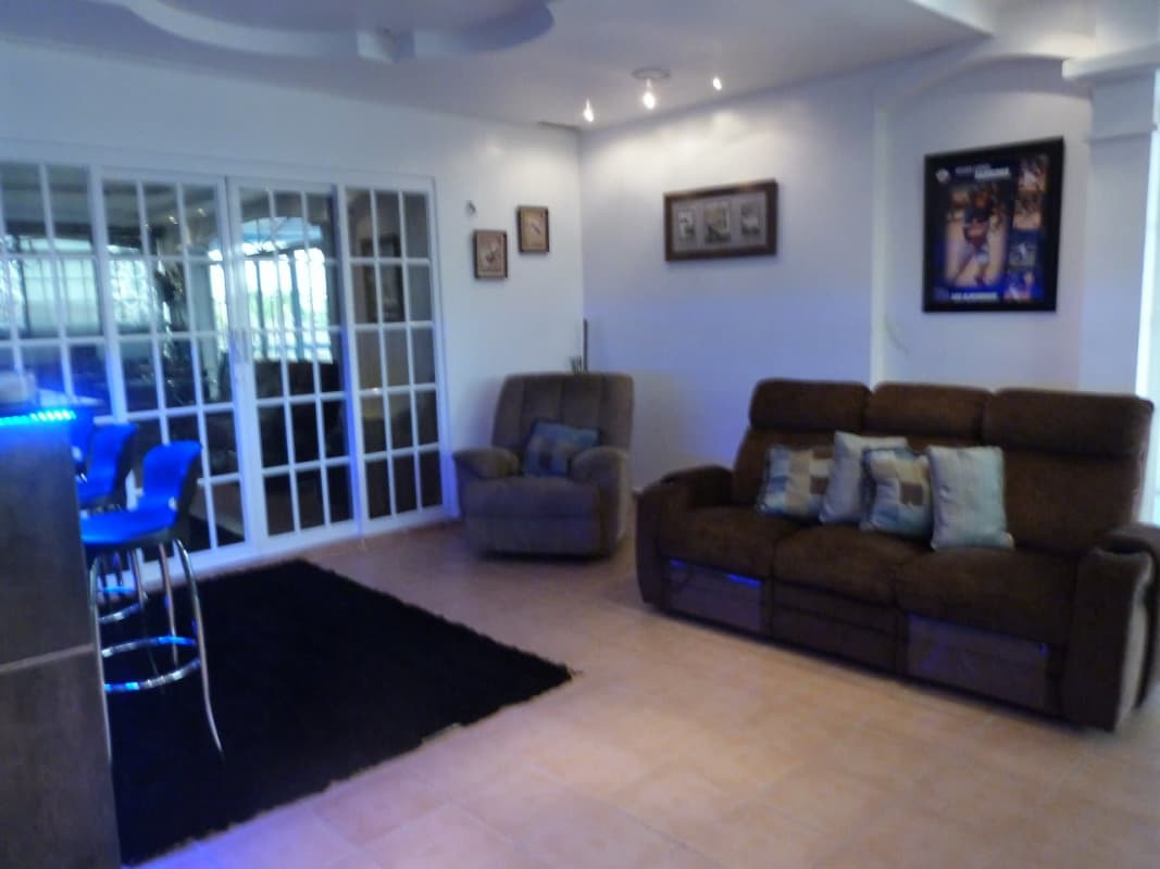 Contemporary kitchen with granite counters, dark cabinetry and appliances San Antonio Panama