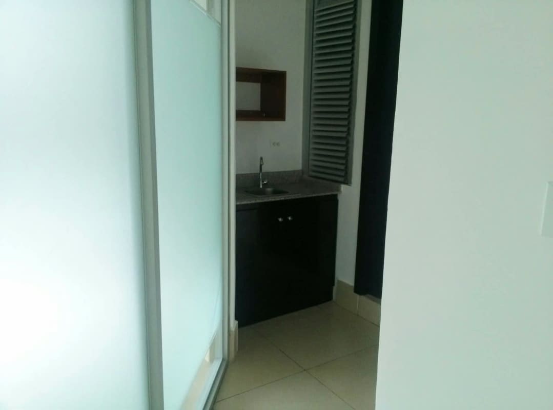 Modern twin high-rise towers exterior with glass facade in Costa del Este Panama office for sale