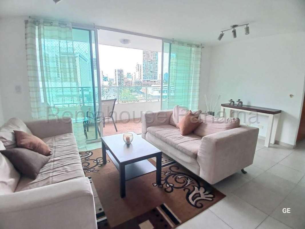 Bedroom featuring large window, closet, and tile floors at PH Terramar Panama