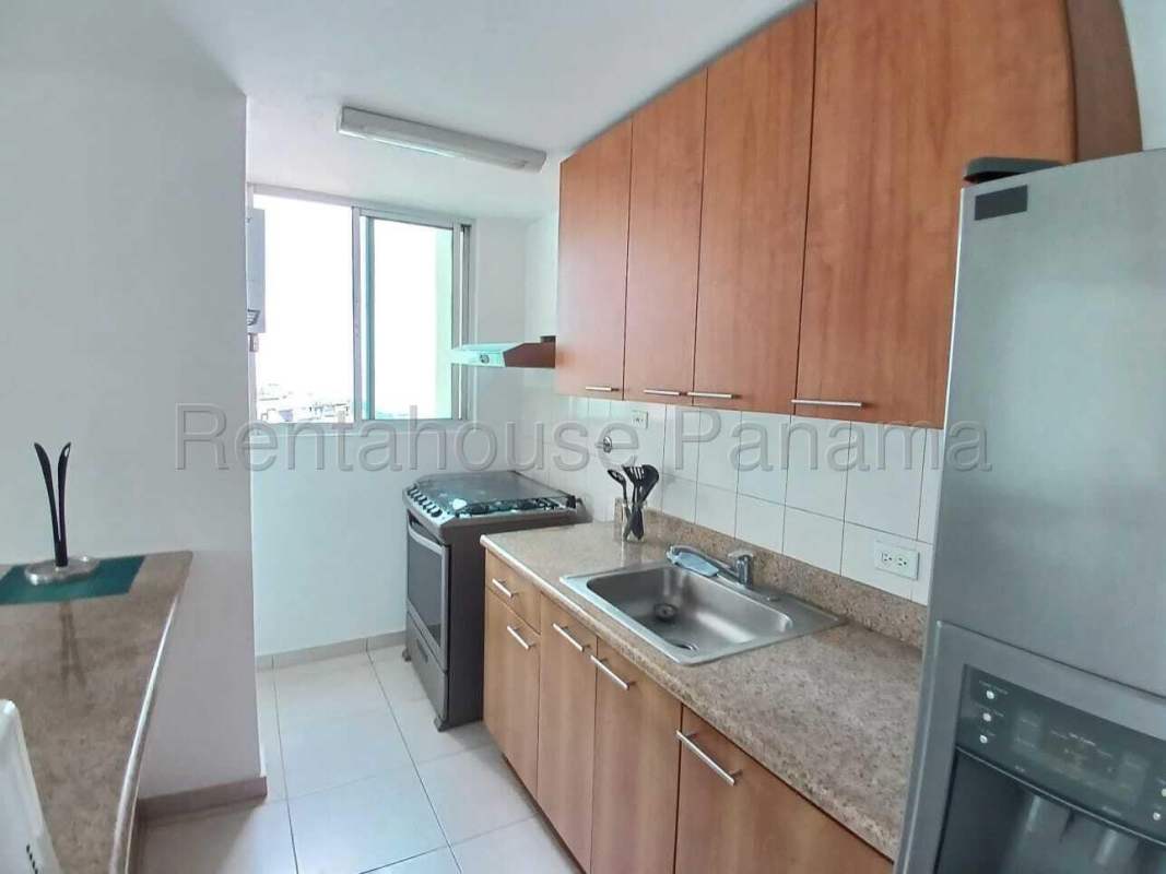 Modern bathroom with glass enclosed shower and granite vanity at PH Terramar Panama City