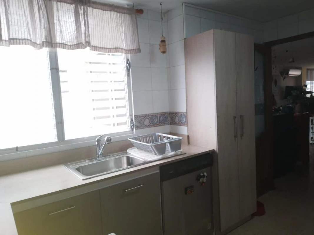 Swimming pool with landscaped gardens at PH Cariari El Carmen Panama City