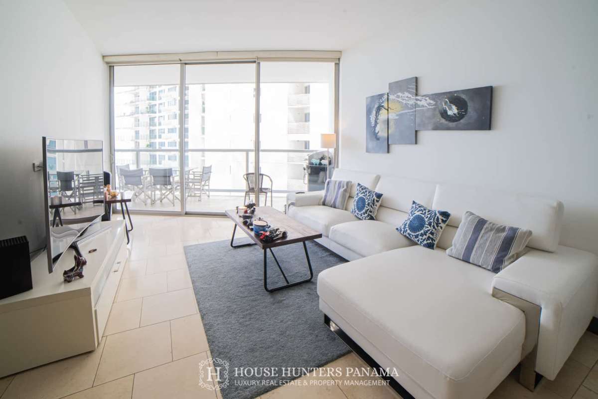 Contemporary kitchen with granite countertops and appliances in The Ocean Club Punta Pacifica Panama