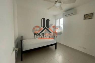 Minimalist bedroom with ceiling fan window and tile floor PH Vista Azul Playa Dorada Arraijan Panama