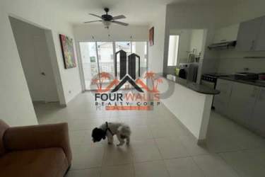 Modern living room with ceiling fan tile floor balcony view PH Vista Azul Playa Dorada Arraijan Panama