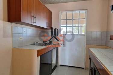 Spacious bedroom with built-in sliding closet and tiled floors Urbanización El Mirador Antón