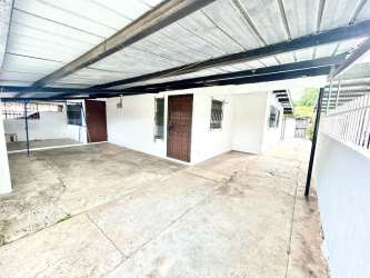 Covered patio/carport area attached to the home at Bello Amor Arraiján Panama