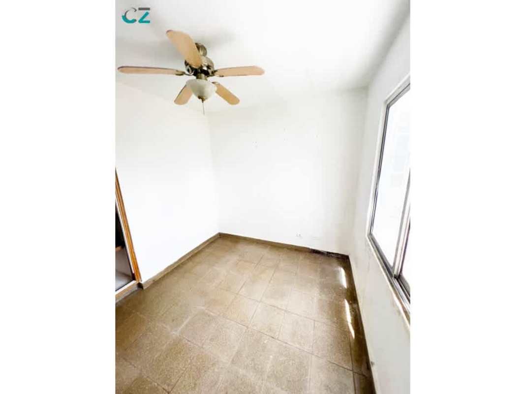 Bedroom with tile floor, ceiling fan and window PH Coco del Mar Tower Panama City